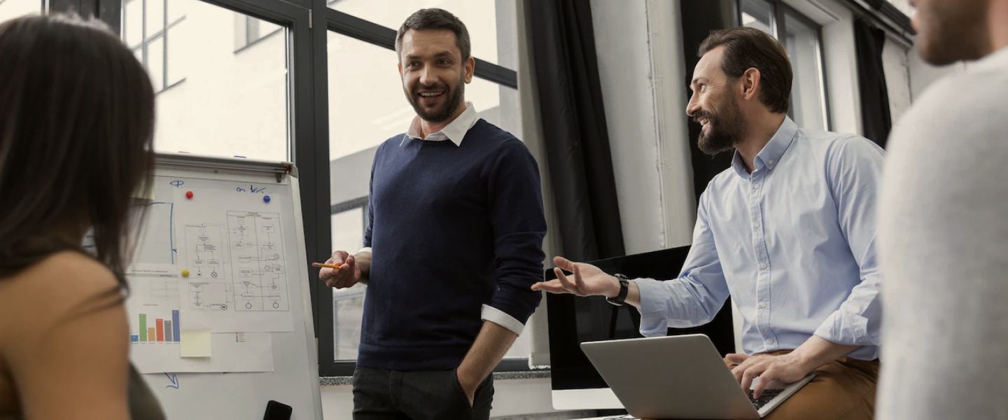 People conversing in a business meeting. 
